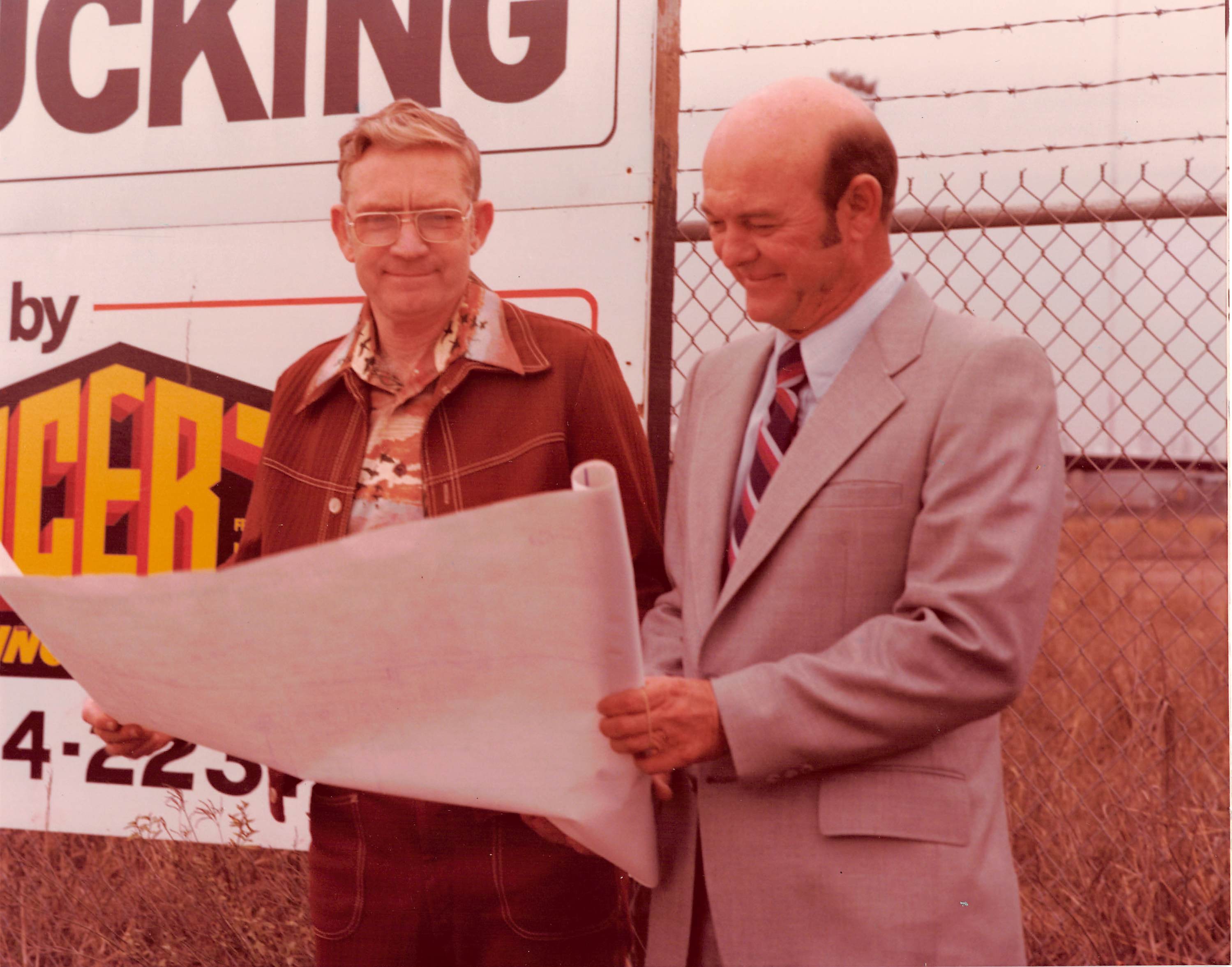 Rex King reviewing plans at the Collingsworth groundbreaking, 1979